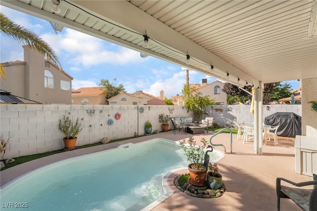 7048 Harbor View Dr, Las Vegas, NV 89119 - view of swimming pool featuring a fenced backyard, a patio, an outdoor hangout area, and area for grilling