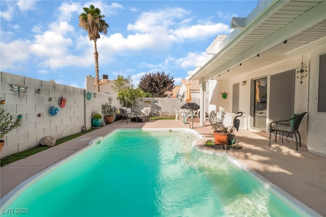 7048 Harbor View Dr, Las Vegas, NV 89119 - view of swimming pool with a patio area and a fenced backyard