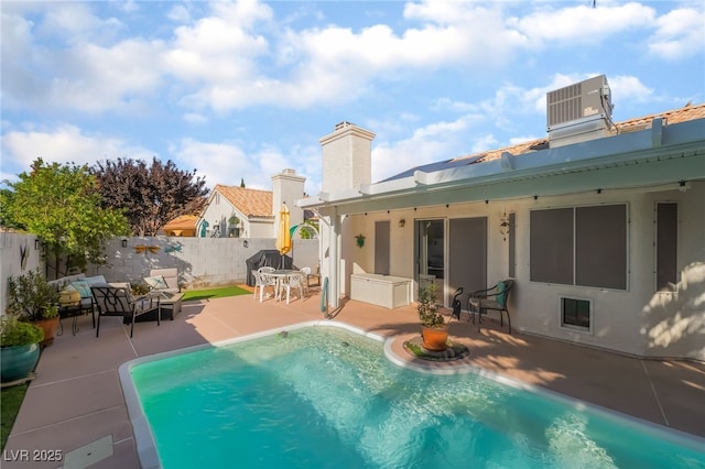 7048 Harbor View Dr, Las Vegas, NV 89119 - view of pool featuring a patio area and an outdoor living space