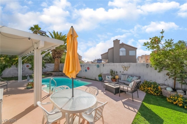 7048 Harbor View Dr, Las Vegas, NV 89119 - fenced backyard with a patio and an outdoor hangout area