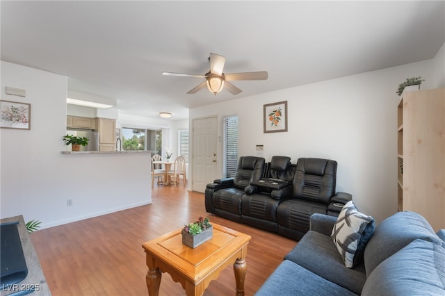 5259 Caspian Springs Dr Unit 204, Las Vegas, NV 89120 - living area with a ceiling fan and light wood finished floors