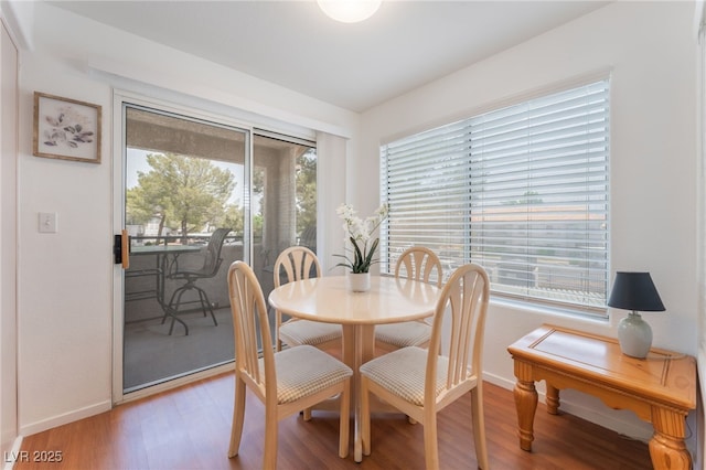 5259 Caspian Springs Dr Unit 204, Las Vegas, NV 89120 - dining space with light wood finished floors and baseboards