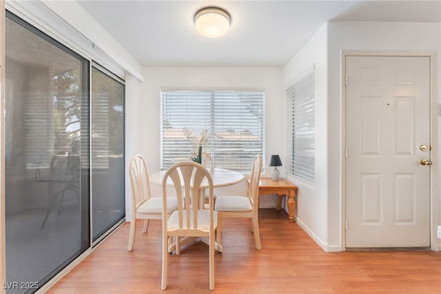 5259 Caspian Springs Dr Unit 204, Las Vegas, NV 89120 - dining area with light wood-style flooring and plenty of natural light