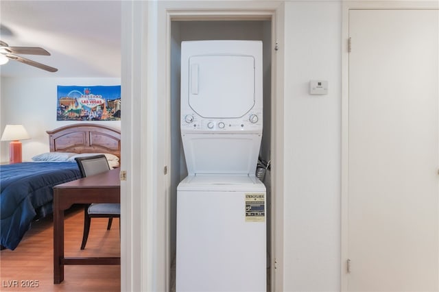 5259 Caspian Springs Dr Unit 204, Las Vegas, NV 89120 - laundry room featuring estacked washer and dryer, ceiling fan, and light wood-style floors