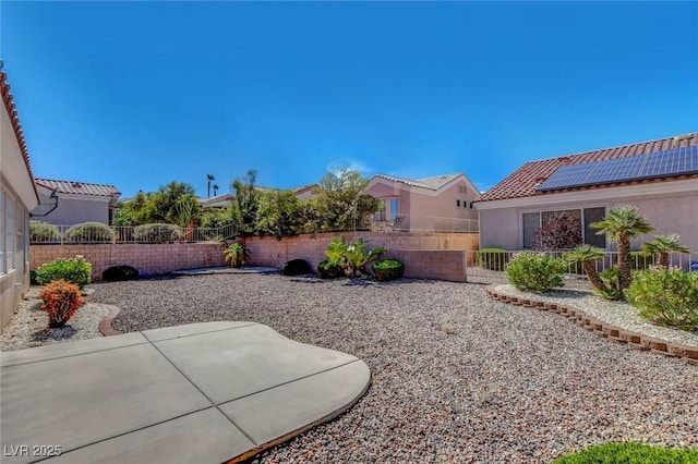 10724 Windledge Ave, Las Vegas, NV 89134 - fenced backyard with a patio