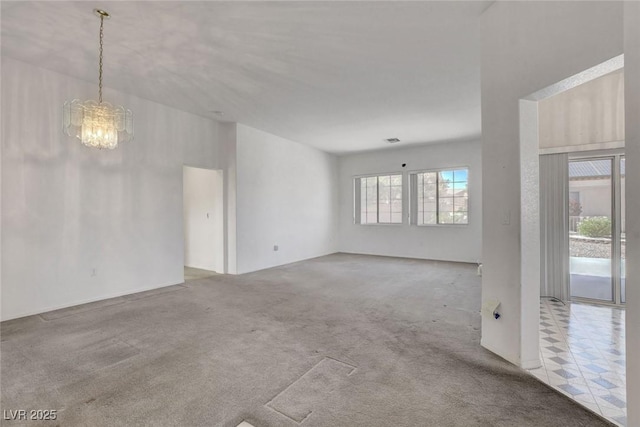 10724 Windledge Ave, Las Vegas, NV 89134 - unfurnished room with a chandelier and carpet