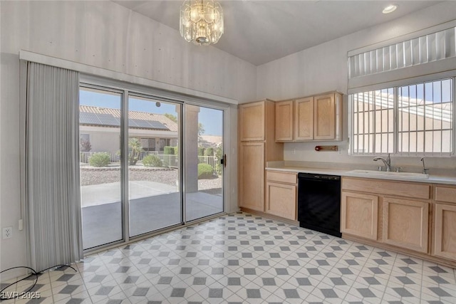 10724 Windledge Ave, Las Vegas, NV 89134 - kitchen featuring black dishwasher, light brown cabinets, light countertops, and a chandelier
