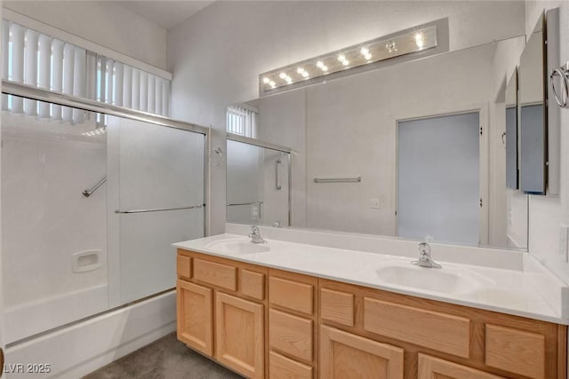 10724 Windledge Ave, Las Vegas, NV 89134 - full bath featuring double vanity and shower / bath combination with glass door