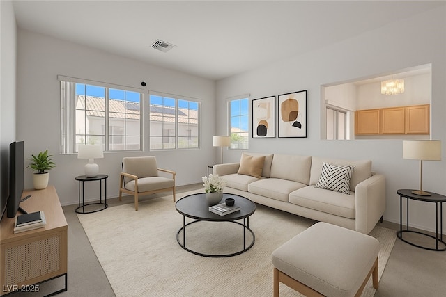 10724 Windledge Ave, Las Vegas, NV 89134 - carpeted living area featuring baseboards and a chandelier