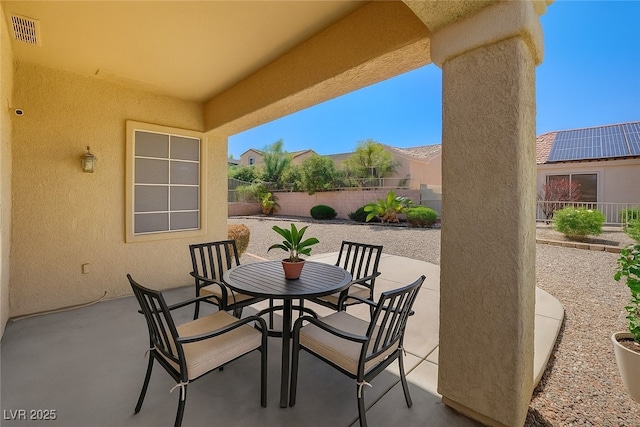 10724 Windledge Ave, Las Vegas, NV 89134 - fenced backyard with a patio area and outdoor dining area