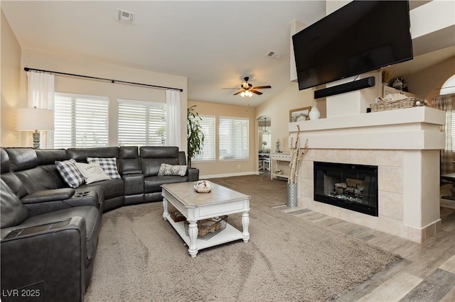 4813 W Virginia Falls Ln, Las Vegas, NV 89130 - living area with ceiling fan, wood finished floors, and a fireplace