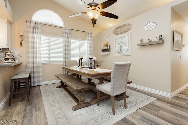 4813 W Virginia Falls Ln, Las Vegas, NV 89130 - dining room with light wood-style floors, ceiling fan, and lofted ceiling
