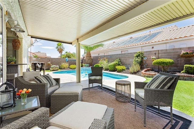 4813 W Virginia Falls Ln, Las Vegas, NV 89130 - fenced backyard featuring a patio area and an outdoor living space