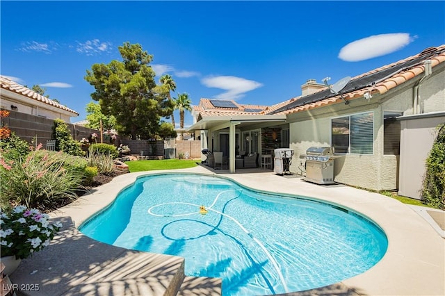 4813 W Virginia Falls Ln, Las Vegas, NV 89130 - view of pool with area for grilling, a fenced backyard, and a patio area