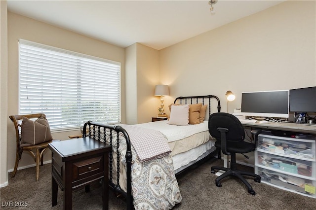 4813 W Virginia Falls Ln, Las Vegas, NV 89130 - carpeted bedroom featuring a desk and baseboards