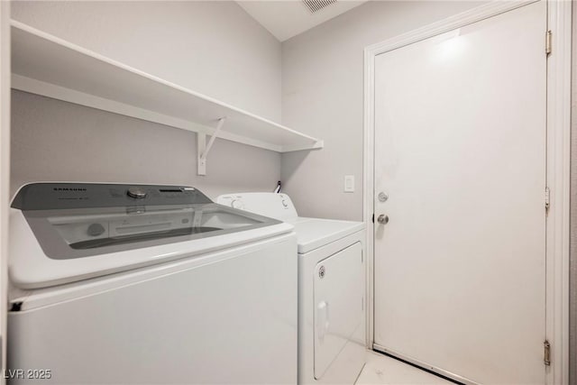 6552 Sweetzer Way, Las Vegas, NV 89108 - laundry room with separate washer and dryer and tile patterned flooring