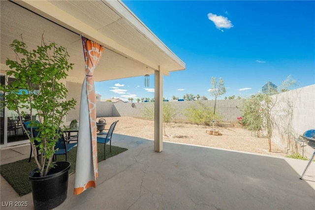 6552 Sweetzer Way, Las Vegas, NV 89108 - fenced backyard featuring a patio
