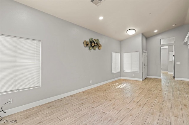 5616 Royal Castle Ln, Las Vegas, NV 89130 - spare room with lofted ceiling, light wood finished floors, and recessed lighting