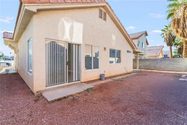 5616 Royal Castle Ln, Las Vegas, NV 89130 - rear view of property featuring stucco siding
