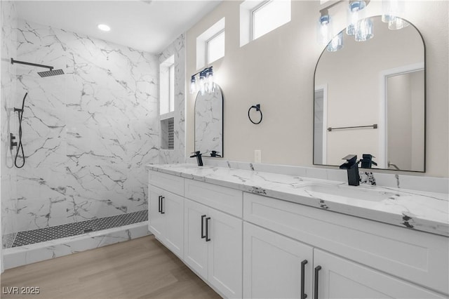 2118 High Mesa Dr, Henderson, NV 89012 - bathroom featuring double vanity, a marble finish shower, wood finished floors, and recessed lighting