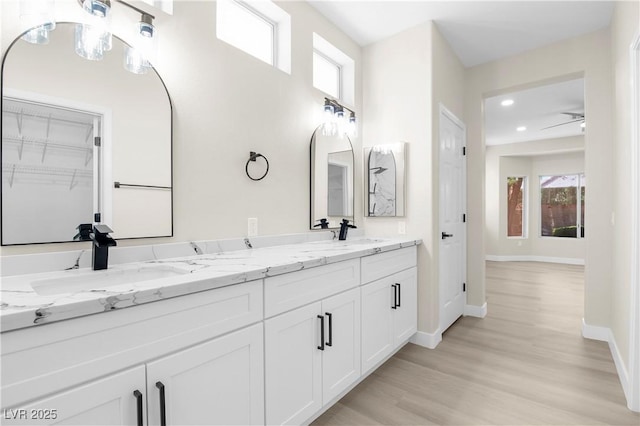2118 High Mesa Dr, Henderson, NV 89012 - full bathroom featuring double vanity, recessed lighting, and wood finished floors