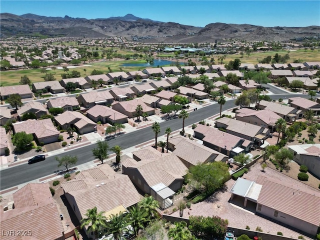 2118 High Mesa Dr, Henderson, NV 89012 - aerial overview of property's location with nearby suburban area and a water and mountain view