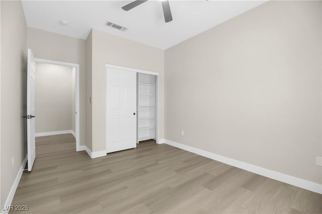 2118 High Mesa Dr, Henderson, NV 89012 - unfurnished bedroom with light wood-style floors, a closet, and ceiling fan