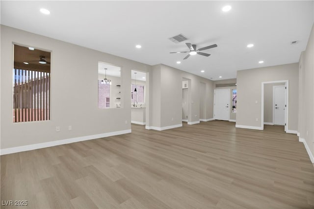 2118 High Mesa Dr, Henderson, NV 89012 - unfurnished living room featuring ceiling fan, light wood-type flooring, and recessed lighting