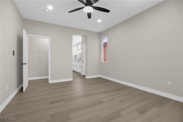 2118 High Mesa Dr, Henderson, NV 89012 - unfurnished bedroom featuring wood finished floors, recessed lighting, ensuite bath, and ceiling fan