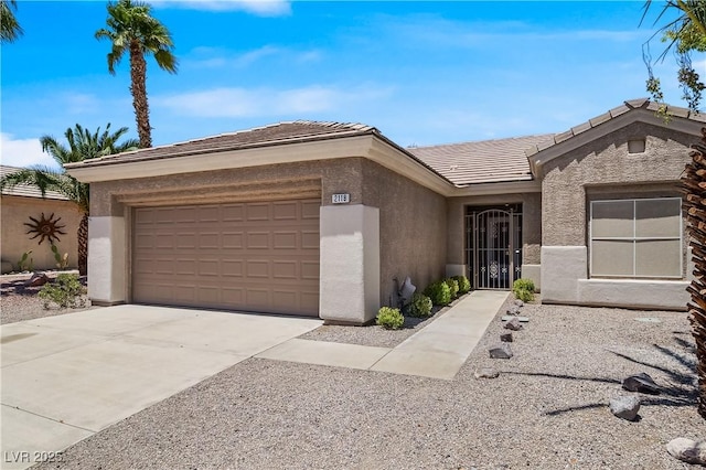 2118 High Mesa Dr, Henderson, NV 89012 - view of front facade with stucco siding, an attached garage, concrete driveway, and a tiled roof