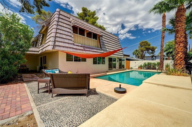 2095 Mohigan Way, Las Vegas, NV 89169 - outdoor pool with a patio area and outdoor lounge area