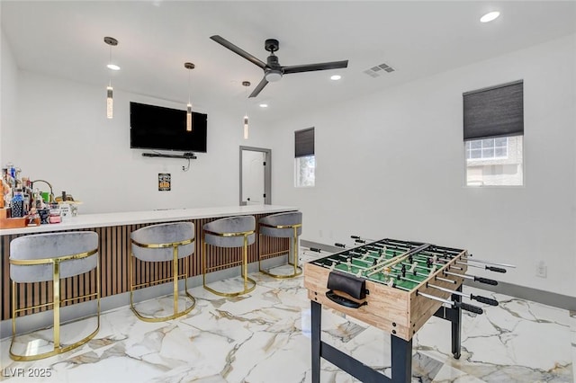 7024 Geese Gathering St, North Las Vegas, NV 89084 - playroom with a dry bar, recessed lighting, a ceiling fan, and marble finish floors