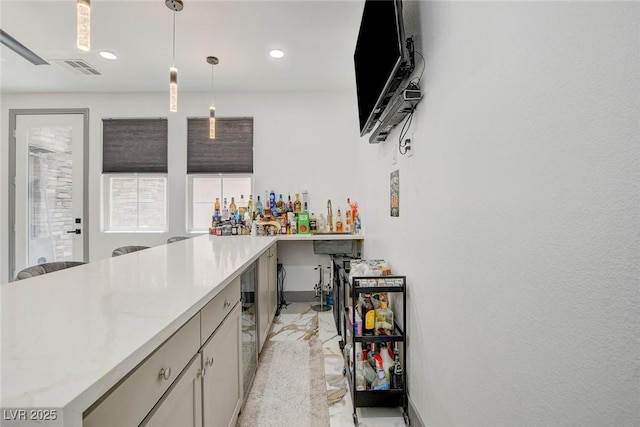 7024 Geese Gathering St, North Las Vegas, NV 89084 - bar area with hanging light fixtures and recessed lighting