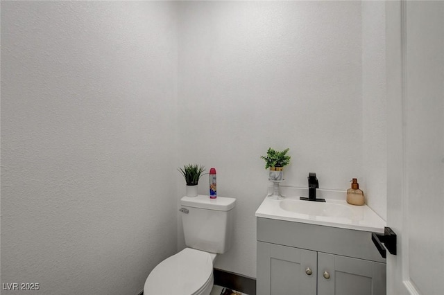 7024 Geese Gathering St, North Las Vegas, NV 89084 - half bathroom featuring toilet and vanity