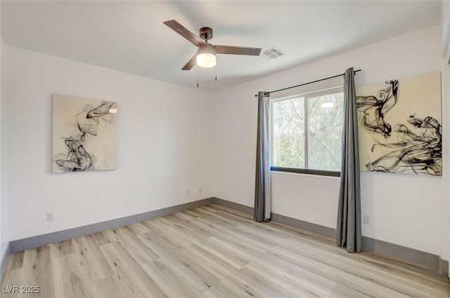 7024 Geese Gathering St, North Las Vegas, NV 89084 - spare room featuring light wood-style flooring and a ceiling fan