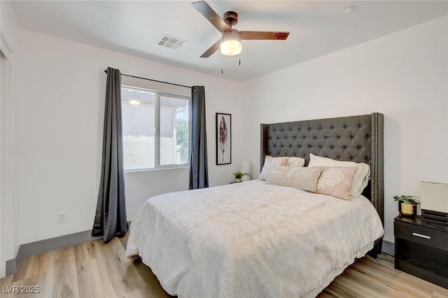 7024 Geese Gathering St, North Las Vegas, NV 89084 - bedroom with light wood-style flooring and ceiling fan