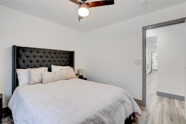 7024 Geese Gathering St, North Las Vegas, NV 89084 - bedroom with light wood-type flooring and a ceiling fan