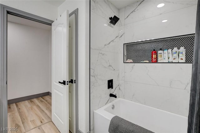 7024 Geese Gathering St, North Las Vegas, NV 89084 - full bath featuring bathing tub / shower combination and wood finished floors