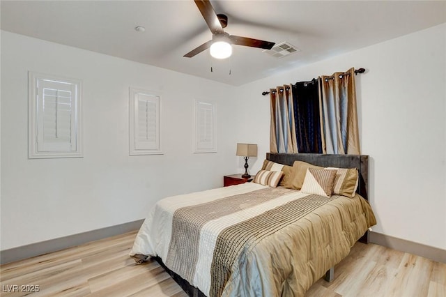 7024 Geese Gathering St, North Las Vegas, NV 89084 - bedroom with light wood-style floors and a ceiling fan