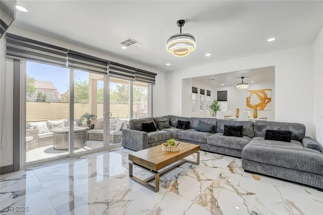 7024 Geese Gathering St, North Las Vegas, NV 89084 - living area with marble tiled flooring and recessed lighting