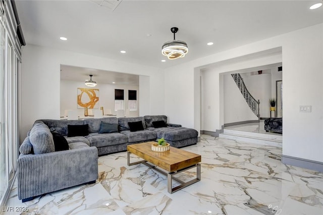 7024 Geese Gathering St, North Las Vegas, NV 89084 - living room featuring recessed lighting, stairway, and marble tiled floors