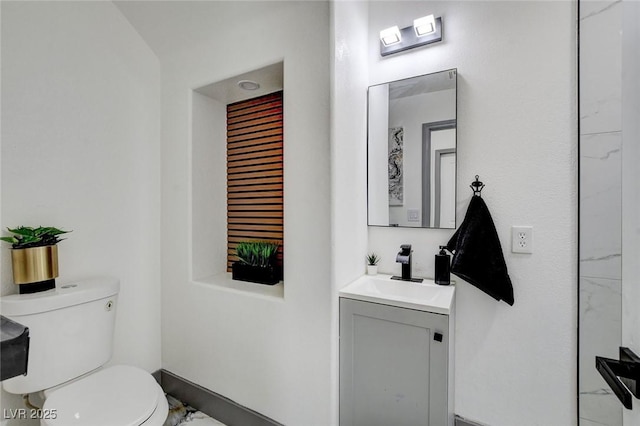 7024 Geese Gathering St, North Las Vegas, NV 89084 - bathroom featuring vanity and marble finish flooring