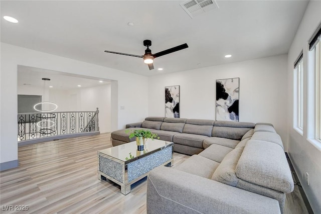 7024 Geese Gathering St, North Las Vegas, NV 89084 - living room with light wood-type flooring, recessed lighting, and ceiling fan