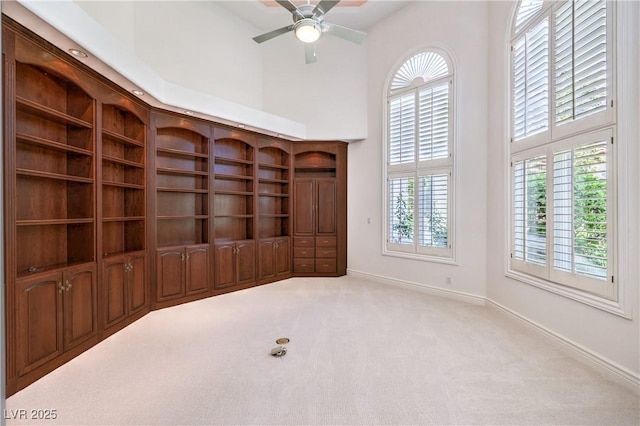 8021 Obannon Dr, Las Vegas, NV 89117 - carpeted spare room featuring a high ceiling and ceiling fan
