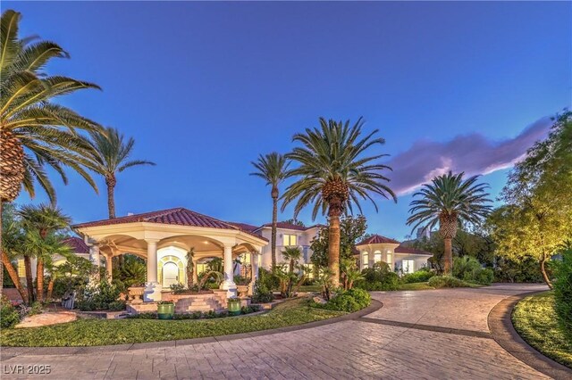 8021 Obannon Dr, Las Vegas, NV 89117 - view of front of house with curved driveway