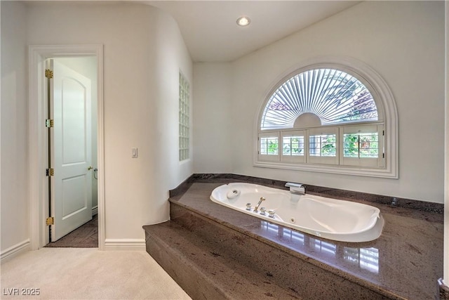 8021 Obannon Dr, Las Vegas, NV 89117 - bathroom with a jetted tub and recessed lighting