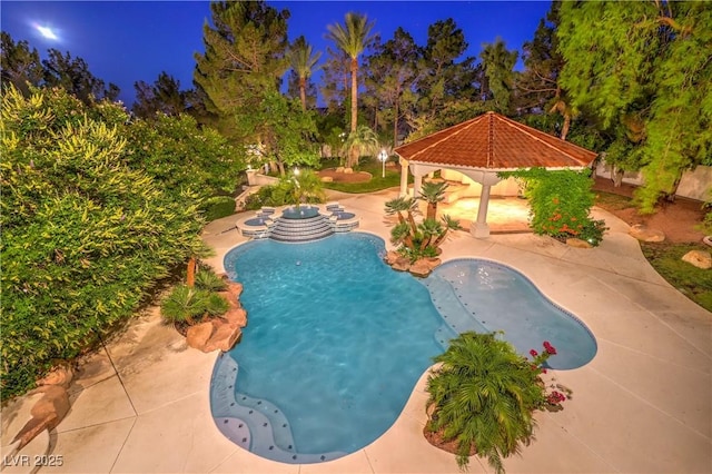 8021 Obannon Dr, Las Vegas, NV 89117 - pool at night with a gazebo, an outdoor pool, and a patio