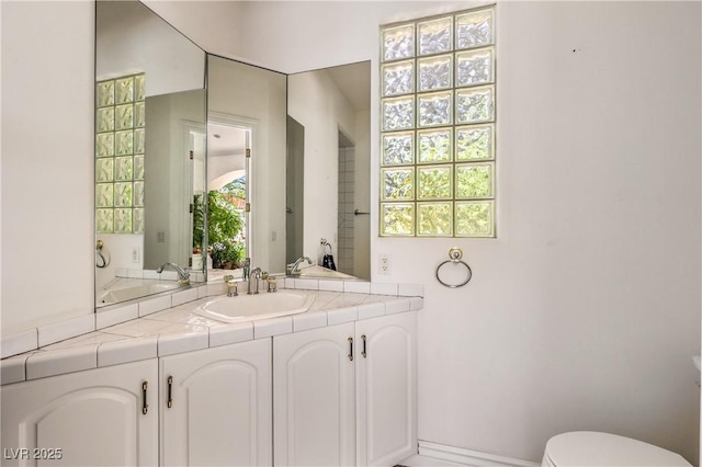 8021 Obannon Dr, Las Vegas, NV 89117 - bathroom with vanity and toilet