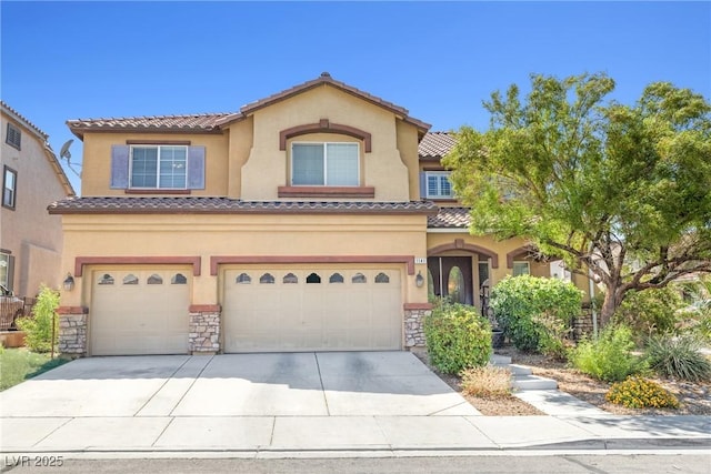 1141 Brent Park Ct, Henderson, NV 89002 - mediterranean / spanish home featuring stone siding, an attached garage, driveway, stucco siding, and a tile roof