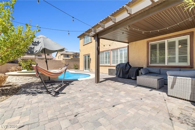 1141 Brent Park Ct, Henderson, NV 89002 - fenced backyard featuring a patio area, outdoor lounge area, and area for grilling